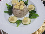 Ofada rice excited by broccoli, banana and cucumber