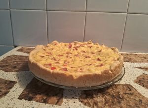 Una foto de Tarta de cebollas y queso con panceta