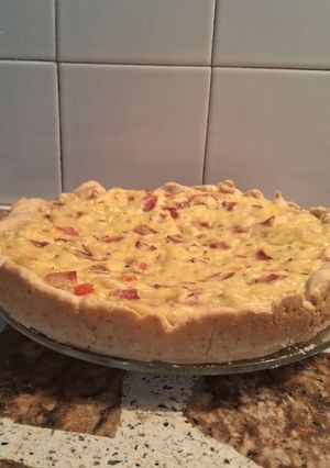 Una foto de Tarta de cebollas y queso con panceta