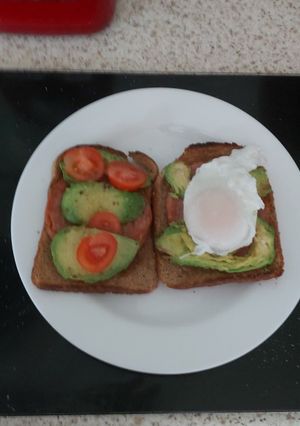 A picture of My Grilled Chopped Pork, Avocado,Tomato & Poached Egg on Toast.