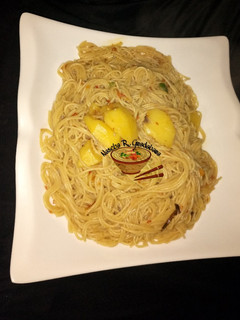 A picture of Jollof din Taliya da dankali.