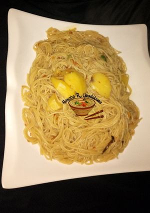 A picture of Jollof din Taliya da dankali.