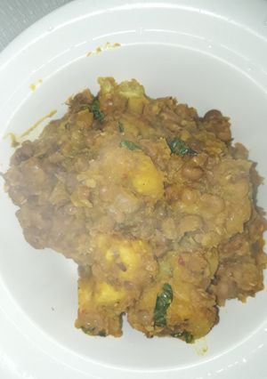 A picture of Porriage beans with unripe plantain and scent leaf.