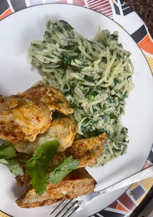A picture of Grilled chicken with spinach carbonara.