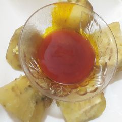 A picture of Sweet potatoes with Palm oil.