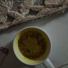 A picture of Keto tea with turmeric and butter.