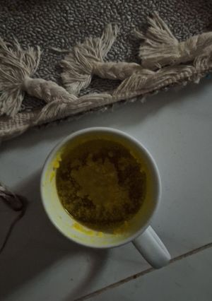 A picture of Keto tea with turmeric and butter.
