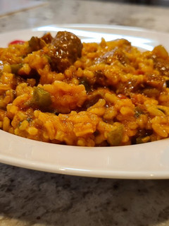 Una foto de Arroz con salchichas