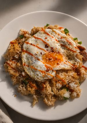 A picture of Chinese Sausage Rice with Fried Egg.