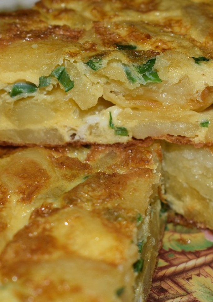Una foto de Tortilla de papas exquisita!
