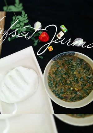 A picture of Shallow rice(tuwon shinkafa) with moringa soup.