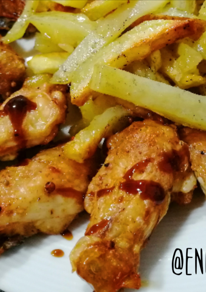Una foto de Alitas de pollo al horno con especias Lousiana Cajún