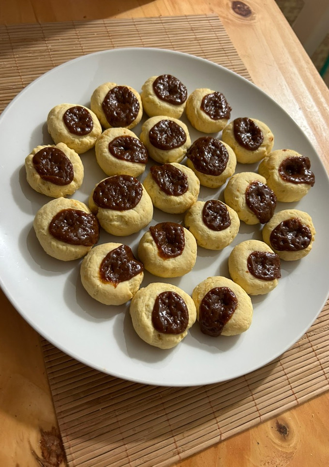 Una foto de Ojitos Dulce de leche o membrillo