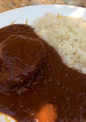 Una foto de Mole rojo oaxaqueño