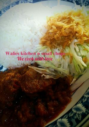 A picture of White rice with stew.