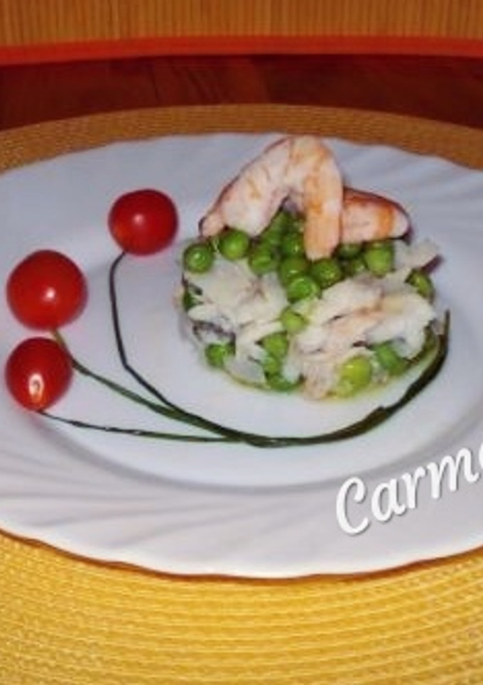 Una foto de Timbal de merluza con guisantes