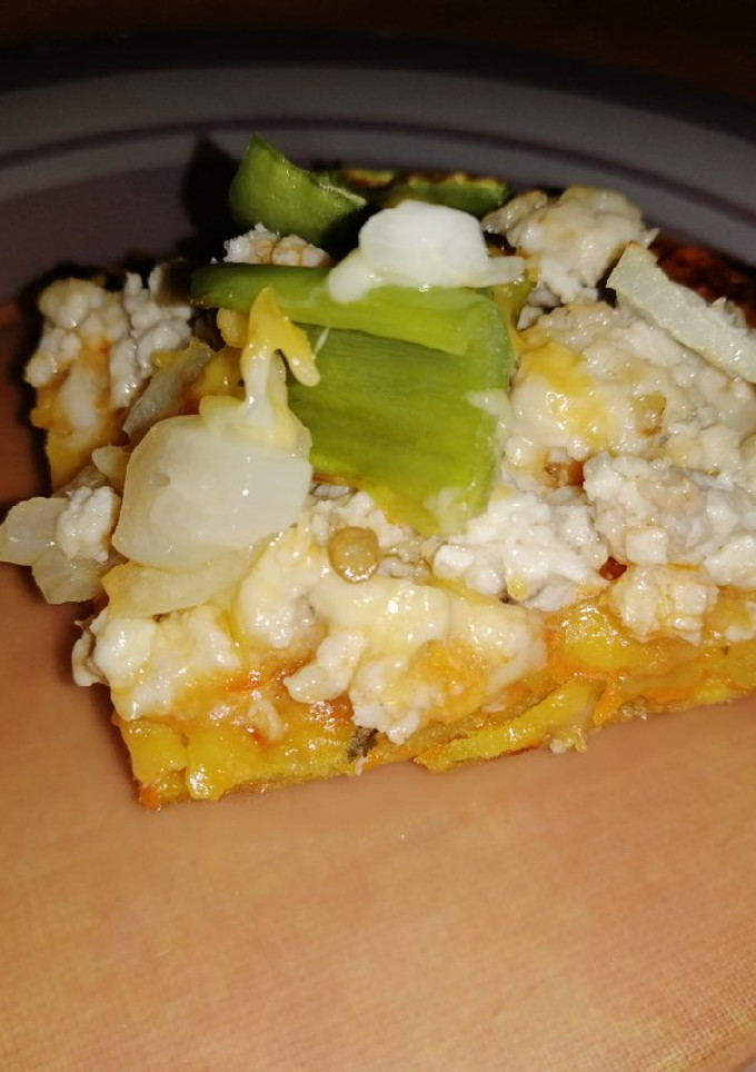 Una foto de Pizza con base de zanahoria