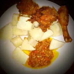 A picture of Boiled yam with chicken sauce.