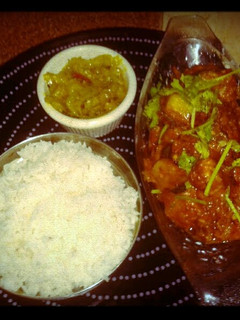 A picture of Spicy lanka fish with cabbage n hot steam white rice. Warning! If u cant take spicy food, dont try this at hm...