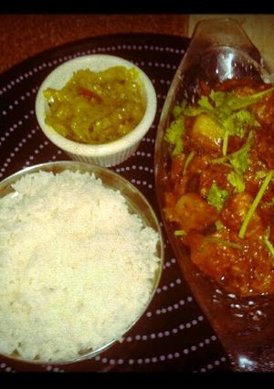 A picture of Spicy lanka fish with cabbage n hot steam white rice. Warning! If u cant take spicy food, dont try this at hm...