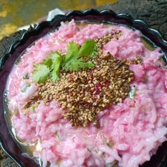 A picture of Beetroot curd rice.