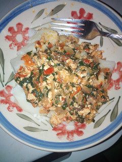 A picture of Boiled yam with vegetable egg sauce.