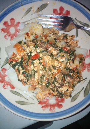 A picture of Boiled yam with vegetable egg sauce.