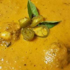 A picture of Spicy Tomato and basil Soup with Cheezy Meatballs.