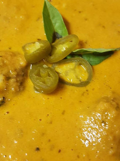 A picture of Spicy Tomato and basil Soup with Cheezy Meatballs.