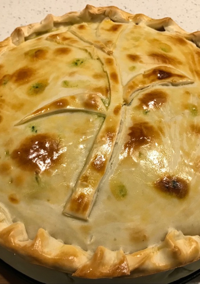 Una foto de Tarta de espinacas, jamón, queso y choclo