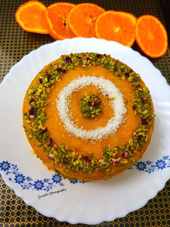 A picture of Basbousa soaked in Orange & Honey syrup.