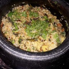 A picture of Veg handi biryani.