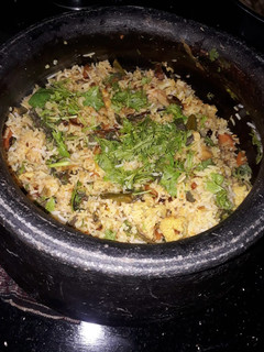 A picture of Veg handi biryani.