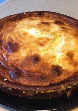 Une photo de Gâteau de fromage blanc à l ugli et mandarine sur fond biscuité