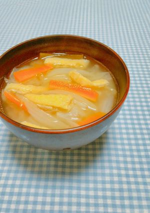 A picture of Delicious Miso Soup with Fried Tofu and Vegetables.