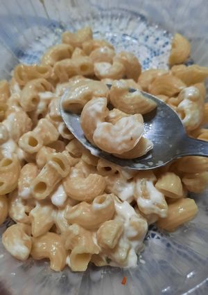 Una foto de Coditos con queso untable saborizado