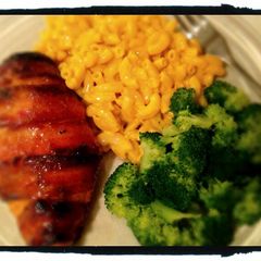 A picture of Sticky Mustard Glazed Bacon wrapped Chicken.