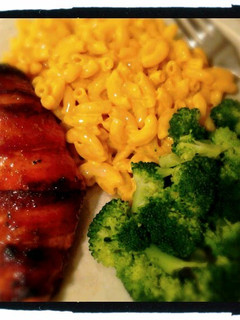 A picture of Sticky Mustard Glazed Bacon wrapped Chicken.