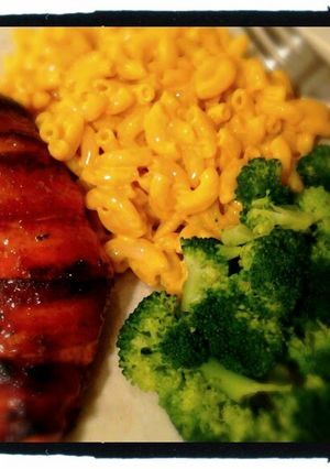 A picture of Sticky Mustard Glazed Bacon wrapped Chicken.