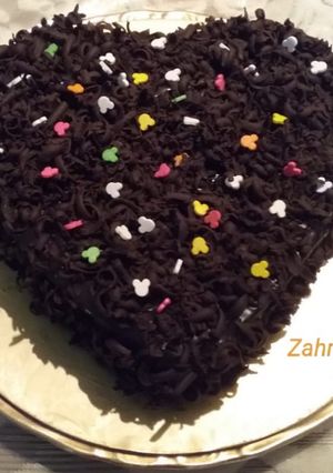 A picture of Chocolate sponge cake with ganache.