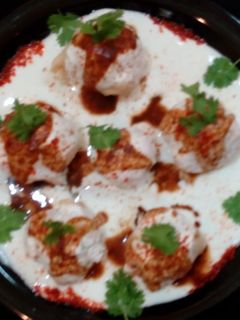 A picture of Cheesy Corn Dahi Vada.