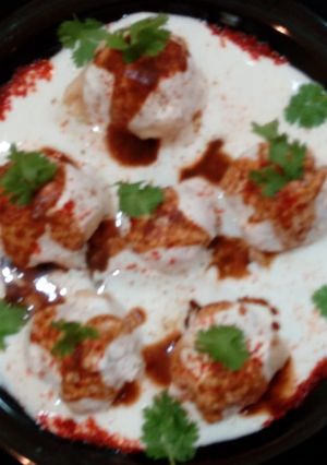 A picture of Cheesy Corn Dahi Vada.
