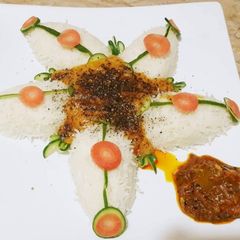 Moong dal With boiled wite Rice and Shan Achar A picture of Moong dal With boiled wite Rice and Shan Achar.