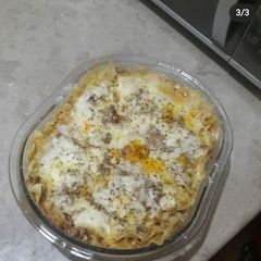 A picture of Chicken lasagna in microwave oven.