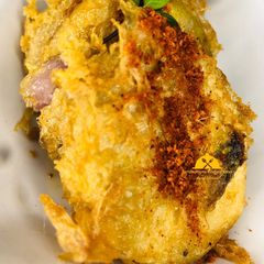 A picture of Fried cook yam and egg.