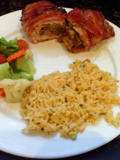 A picture of Bacon wrapped stuffed pork chops.