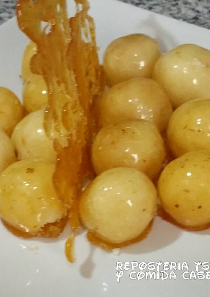 Una foto de Bolas de coco caramelizada