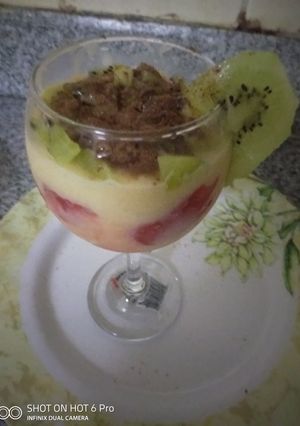 A picture of Fruits with custard#breakfastquickfix#jikonichallenge.