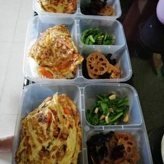 A picture of Pumpkin Rice with omelet, mix vegetables.