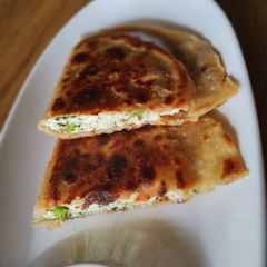 A picture of Gujiya like Paneer paratha.